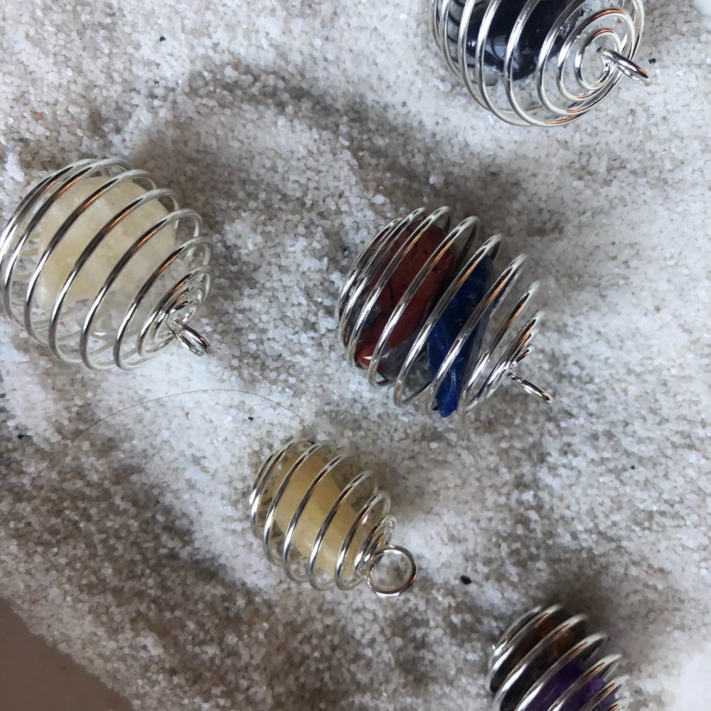 Stone pendants and spiral cage switch out stone